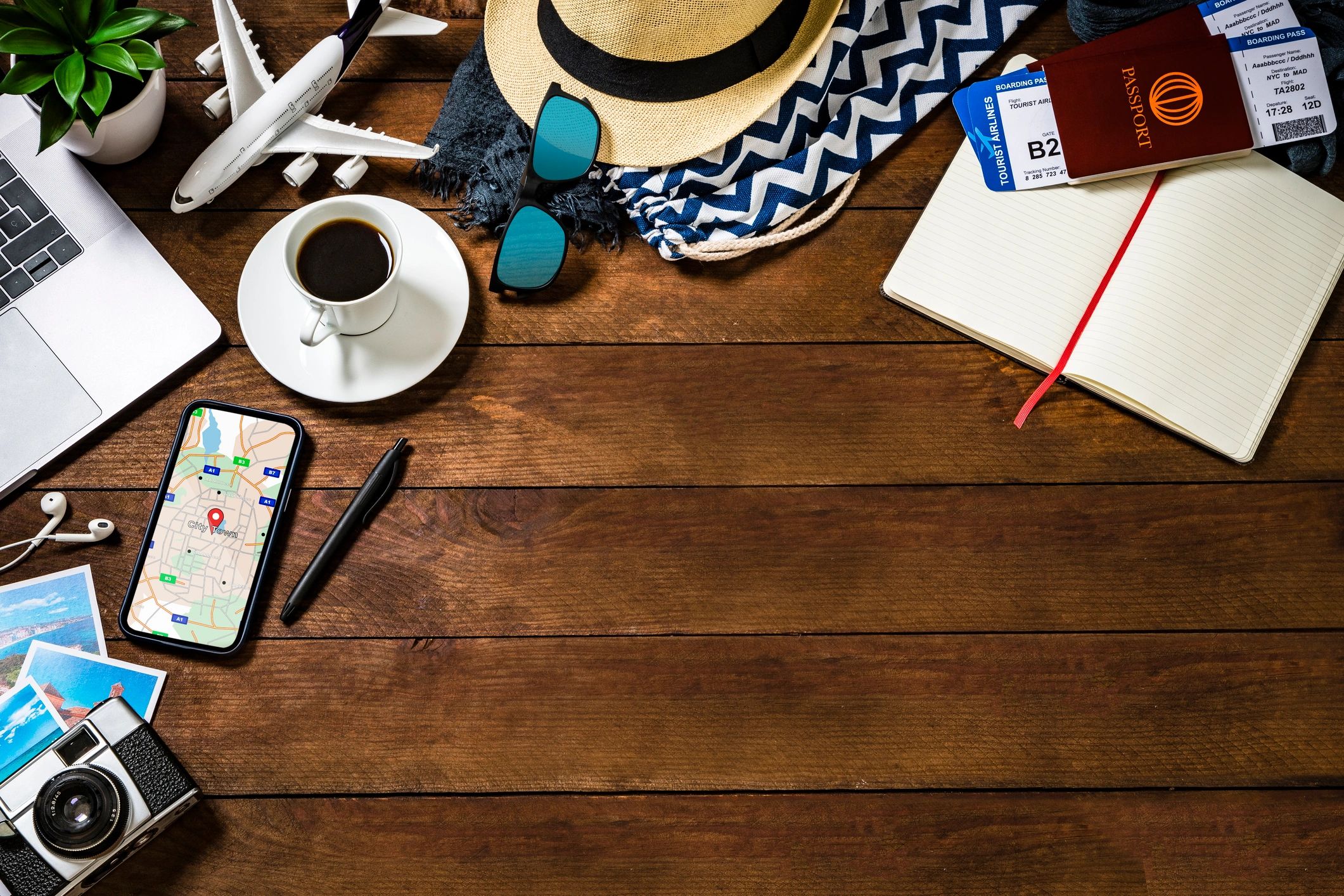 Travel planning flatlay with passports and notebook